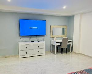 TV a/nebo společenská místnost v ubytování Noè Hotel 1 king bedroom # 10 + 4 fotografie