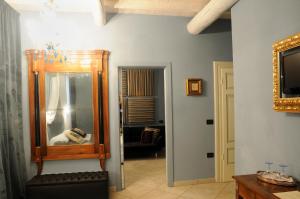 TV a/nebo společenská místnost v ubytování B&B A Casa Dell'Antiquario