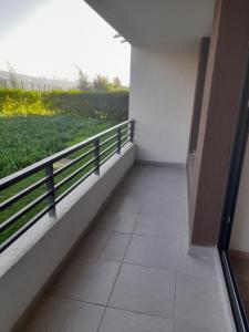 a hallway of a building with a view of a field at Departamento en Viña del Mar in Viña del Mar