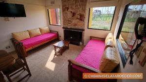 Μια τηλεόραση ή/και κέντρο ψυχαγωγίας στο Cabañas el atardecer