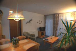 Ein Sitzbereich in der Unterkunft Villa Linde