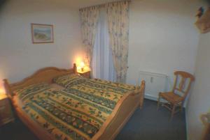 Ein Bett oder Betten in einem Zimmer der Unterkunft Villa Linde
