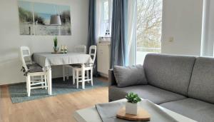 Ein Sitzbereich in der Unterkunft Villa Linde