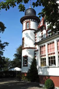 a lighthouse on the side of a building at Villa Sophienhöhe in Kerpen