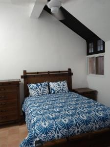 Ένα ή περισσότερα κρεβάτια σε δωμάτιο στο Sosua Apartment 4-Bedrooms