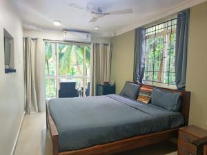 Кровать или кровати в номере Kanvas Suites - Sun N Moon
