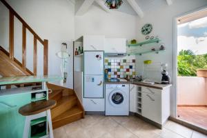 Kuchyň nebo kuchyňský kout v ubytování Complexe La Providencia - Villa, Duplex, Studio, jacuzzi