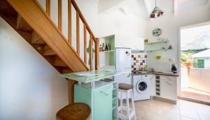 Kuchyň nebo kuchyňský kout v ubytování Complexe La Providencia - Villa, Duplex, Studio, jacuzzi