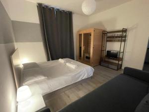 Posteľ alebo postele v izbe v ubytovaní Belli 4 Apartment - Sauna -