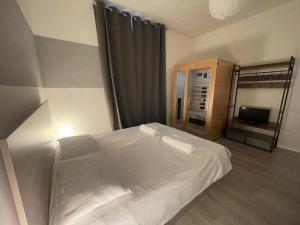 Posteľ alebo postele v izbe v ubytovaní Belli 4 Apartment - Sauna -