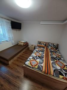Postel nebo postele na pokoji v ubytování Willa Do-Dar