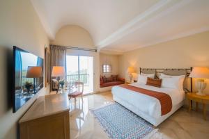 Кровать или кровати в номере The Residence Tunis