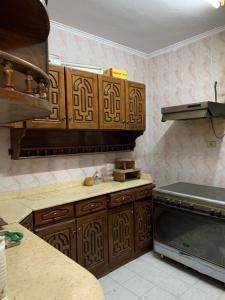 Kuchyň nebo kuchyňský kout v ubytování Azzam Guest House 1 families only
