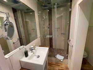 Koupelna v ubytování Hotel Villa Schwanebeck