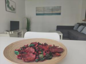 A television and/or entertainment centre at Albir cosy apartment