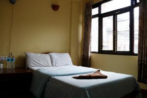 Ένα ή περισσότερα κρεβάτια σε δωμάτιο στο Hotel Yala Peak