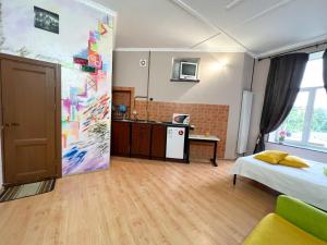 Η κουζίνα ή μικρή κουζίνα στο Apartment in the historic center +5 φωτογραφίες