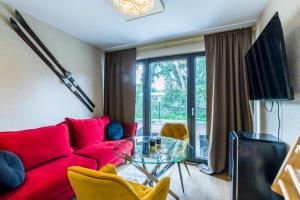 TV a/nebo společenská místnost v ubytování Aparthome Tatra