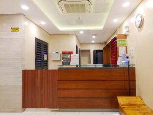 Ο χώρος του λόμπι ή της ρεσεψιόν στο Kaizen Suites