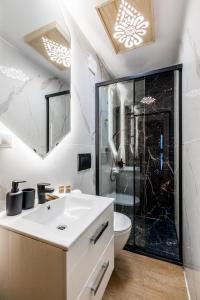 Koupelna v ubytování Aparthome Tatra + 36 fotografií