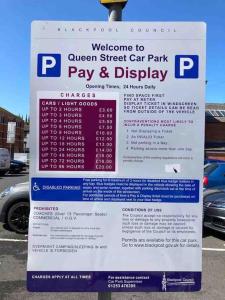 a parking sign for a car park pay and display at Veyron Apartments - part of the V Group in Blackpool