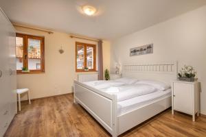Postel nebo postele na pokoji v ubytování Dorf Residenz