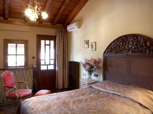 Posteľ alebo postele v izbe v ubytovaní Boutique Hotel Kokkino Spiti