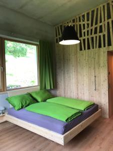 Tempat tidur dalam kamar di Kieferhof