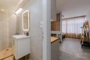 Ένα μπάνιο στο Ellis Paradise City Apartments, Vesta Philoxenia