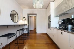 Køkken eller tekøkken på Castello Luxury Apartment - in the heart of Milan