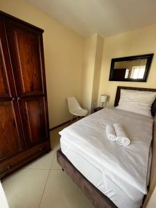 Ένα ή περισσότερα κρεβάτια σε δωμάτιο στο Apartments Wile Süd