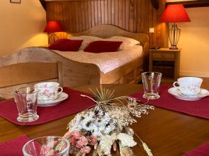 Postel nebo postele na pokoji v ubytování Manoir de Saint-Fiacre