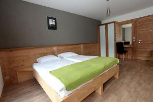 Postelja oz. postelje v sobi nastanitve Helvetia hotel