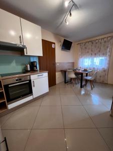 Η κουζίνα ή μικρή κουζίνα στο Apartments Wile Süd