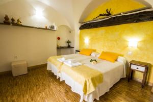 Posteľ alebo postele v izbe v ubytovaní La Posada de Grimaldo