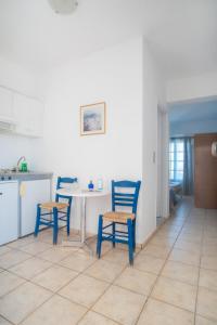 Kuchyň nebo kuchyňský kout v ubytování Manos Rooms