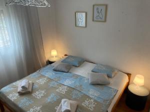 Postel nebo postele na pokoji v ubytování Quite beautiful apartment in the Split Neda with 4bedrooms