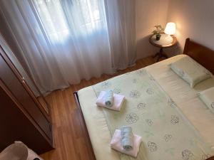 Postel nebo postele na pokoji v ubytování Quite beautiful apartment in the Split Neda with 4bedrooms