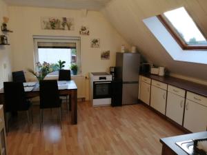 Kuchyň nebo kuchyňský kout v ubytování Ferienwohnung altes Steinlager