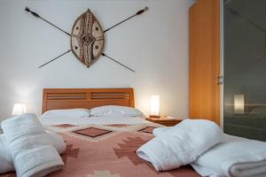 Posteľ alebo postele v izbe v ubytovaní Apartamento Tribalia Cadiz