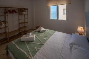 Posteľ alebo postele v izbe v ubytovaní Apartamento Tribalia Cadiz