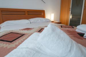 Posteľ alebo postele v izbe v ubytovaní Apartamento Tribalia Cadiz
