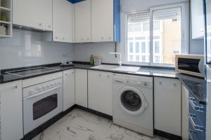 Kuchyňa alebo kuchynka v ubytovaní Apartamento Tribalia Cadiz