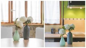 dos fotos de jarrones con flores en una mesa en La Casita de Toledo by Toledo AP, en Toledo 15 fotos más