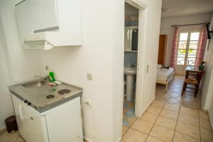 Köök või kööginurk majutusasutuses Manos Rooms