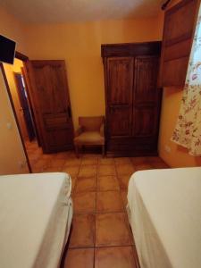 Postel nebo postele na pokoji v ubytování La Casa de los Gatos