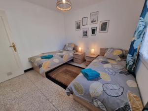 Posteľ alebo postele v izbe v ubytovaní Proche gare et centre-ville, 2 chambres cosy