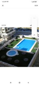 Bazén v ubytování Valdelagrana vista al mar Puerto de Santa María nebo v jeho okolí