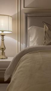 Voodi või voodid majutusasutuse The Key - Luxury Apartment toas