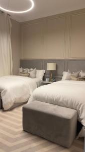 Voodi või voodid majutusasutuse The Key - Luxury Apartment toas